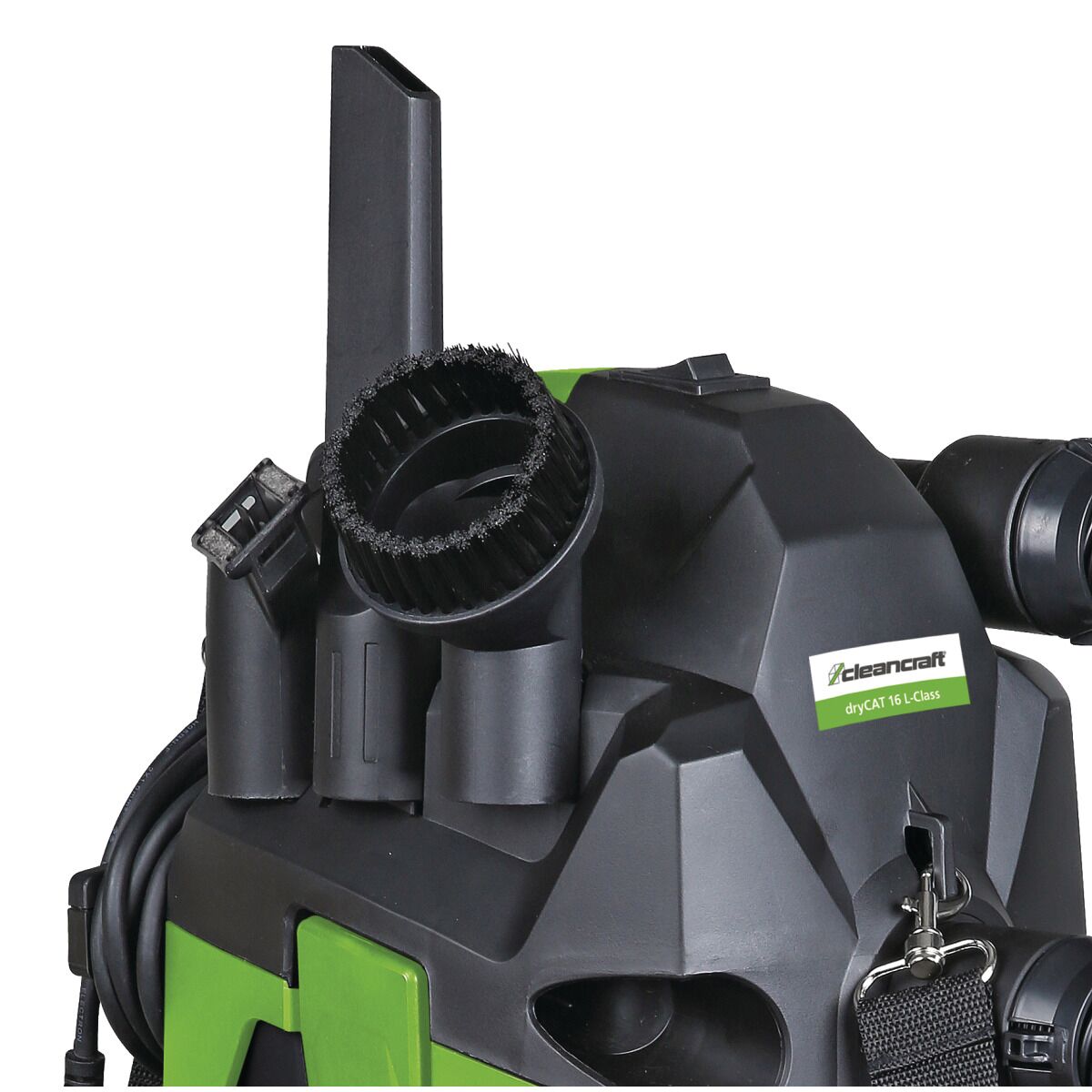 Nahaufnahme der Zubehörhalterung mit Bürsten- und Fugendüse am Staubsaugerkopf.