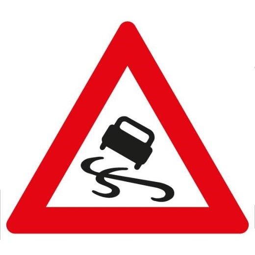 Verkehrsschild mit rotem Dreieck und schleudernden Auto, das auf Schleudergefahr hinweist.