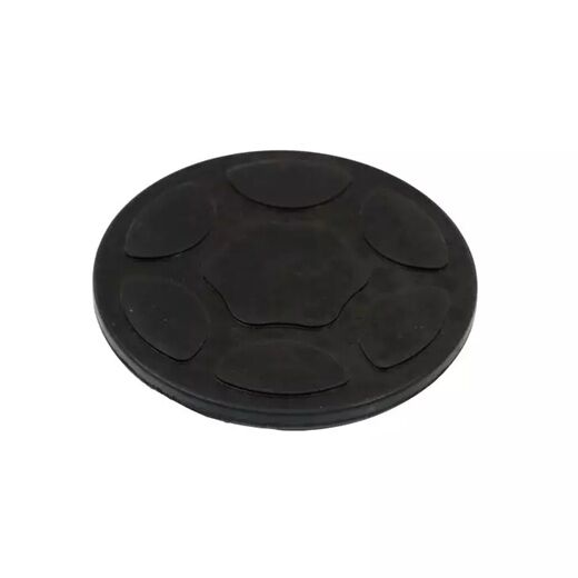 Runde schwarze Gummiauflage mit strukturiertem Muster oben, dient als Schutz- oder Druckplatte für Hebebühnen oder Wagenheber.