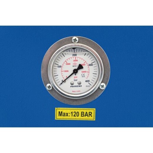 Runder Druckmesser mit Skala in bar und psi, gelbes Schild mit Maximalwert 120 bar.
