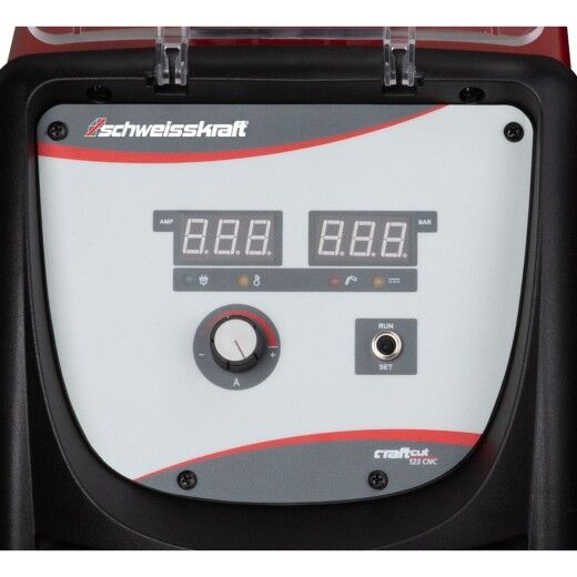 Bedienfeld eines Plasma-Schneidgeräts mit Drehknopf, Kippschalter und Kontrollleuchten unter einem transparenten Deckel.