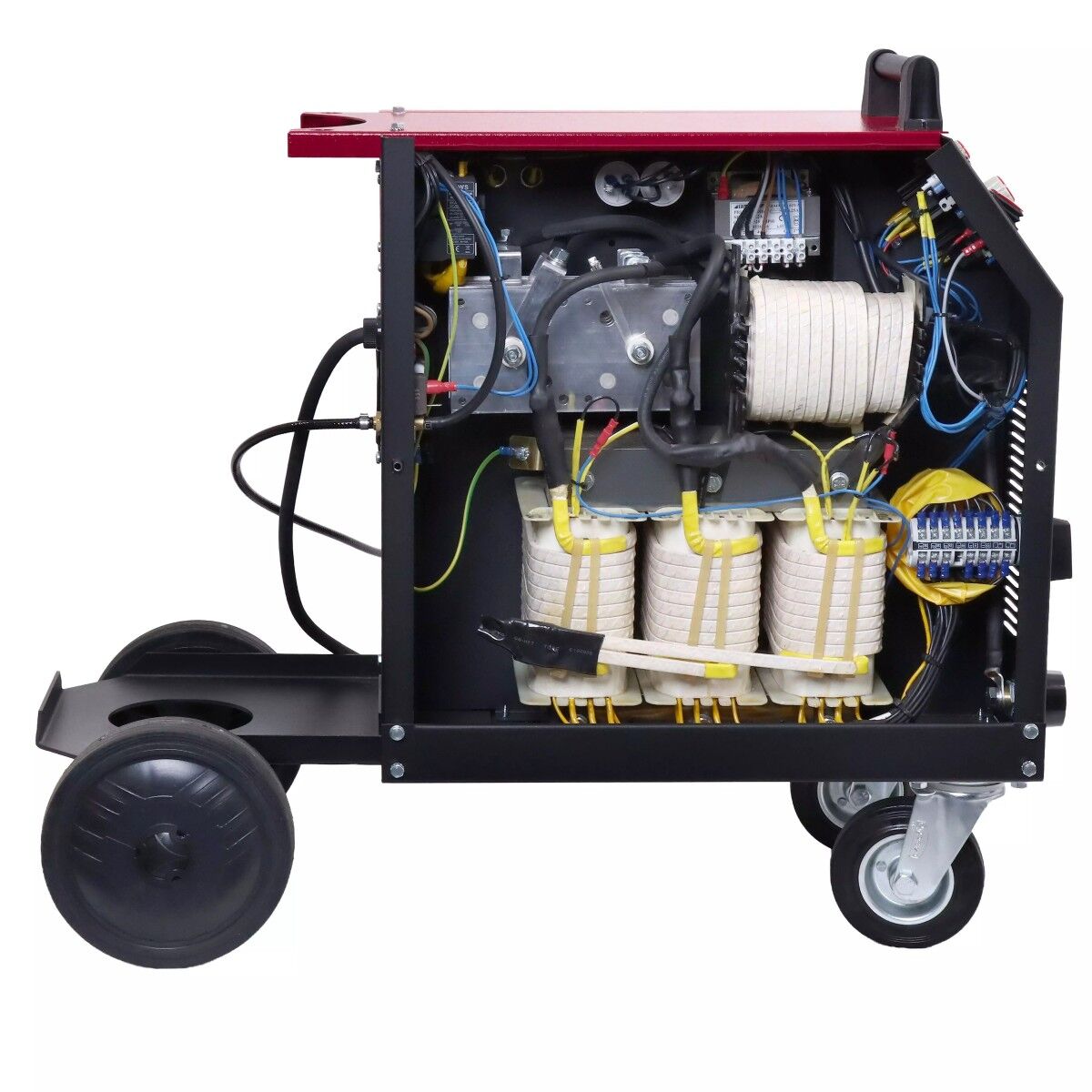 Geöffnetes Gerät: Innenansicht mit Spulen/Transformatoren, Kabeln und Klemmen; unten Fahrgestell mit Rädern.